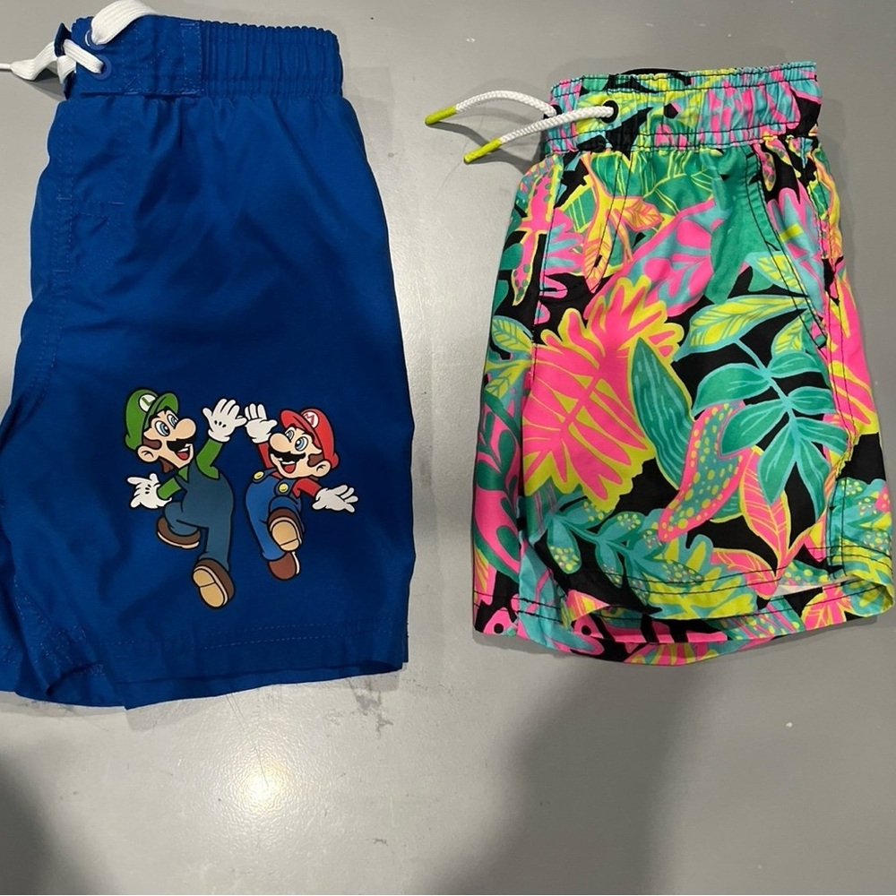 Boys swim shorts Nintendo Blue and tropical swim shorts 6/7